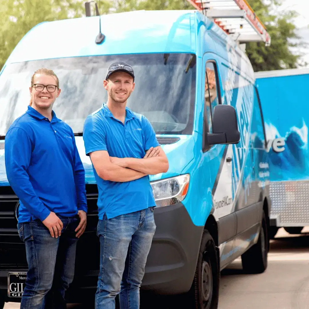 Bleuwave HVAC technicians with a company service van in Phoenix